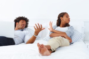 couple-in-bed-arguing-500x330